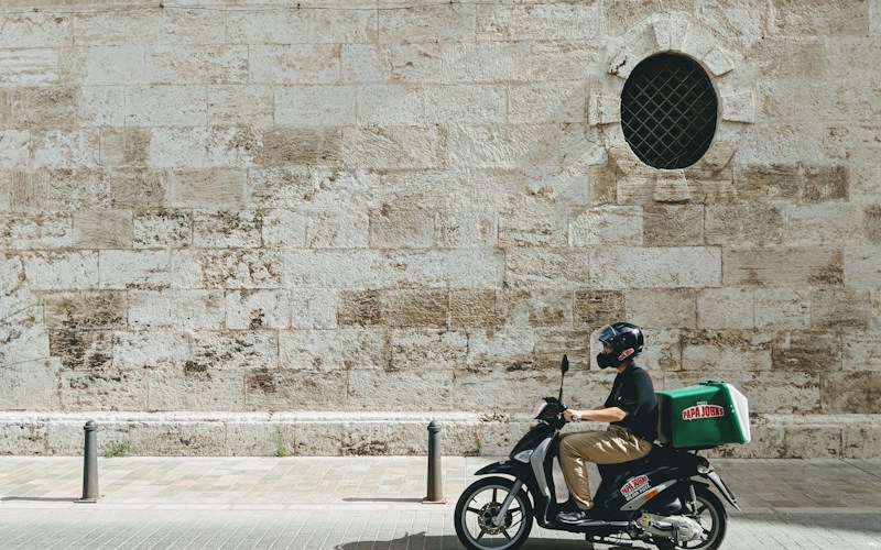 Delivery rider on a scooter